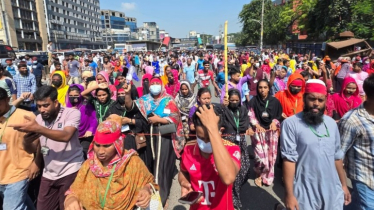 উত্তরায় সড়কের অবস্থান ছাড়লেন শ্রমিকরা: যান চলাচল স্বাভাবিক