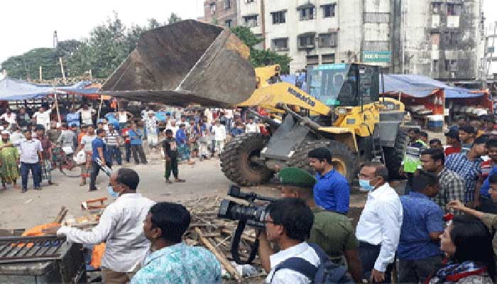 কুর্মিটোলা এলাকা থেকে ৭৬ অস্থায়ী ঘর উচ্ছেদ কুর্মিটোলা এলাকা থেকে ৭৬ অস্থায়ী ঘর উচ্ছেদ